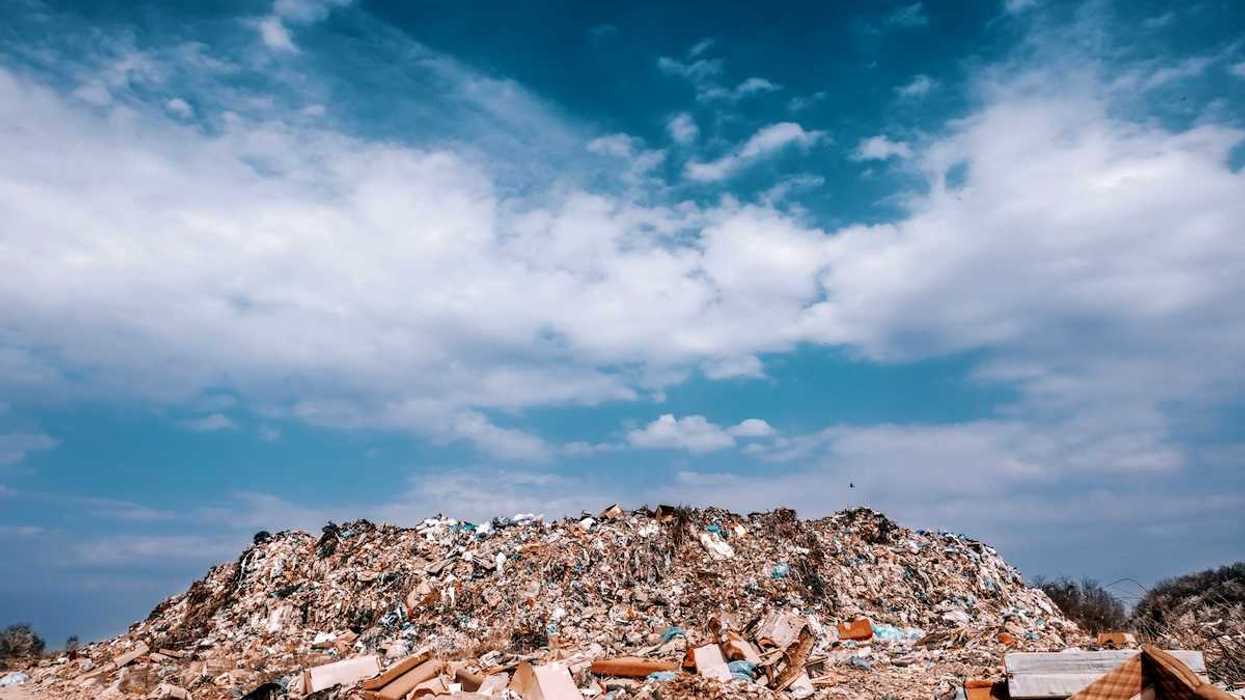 Mountainous heap of landfill trash