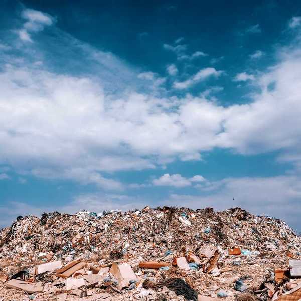 Mountainous heap of landfill trash