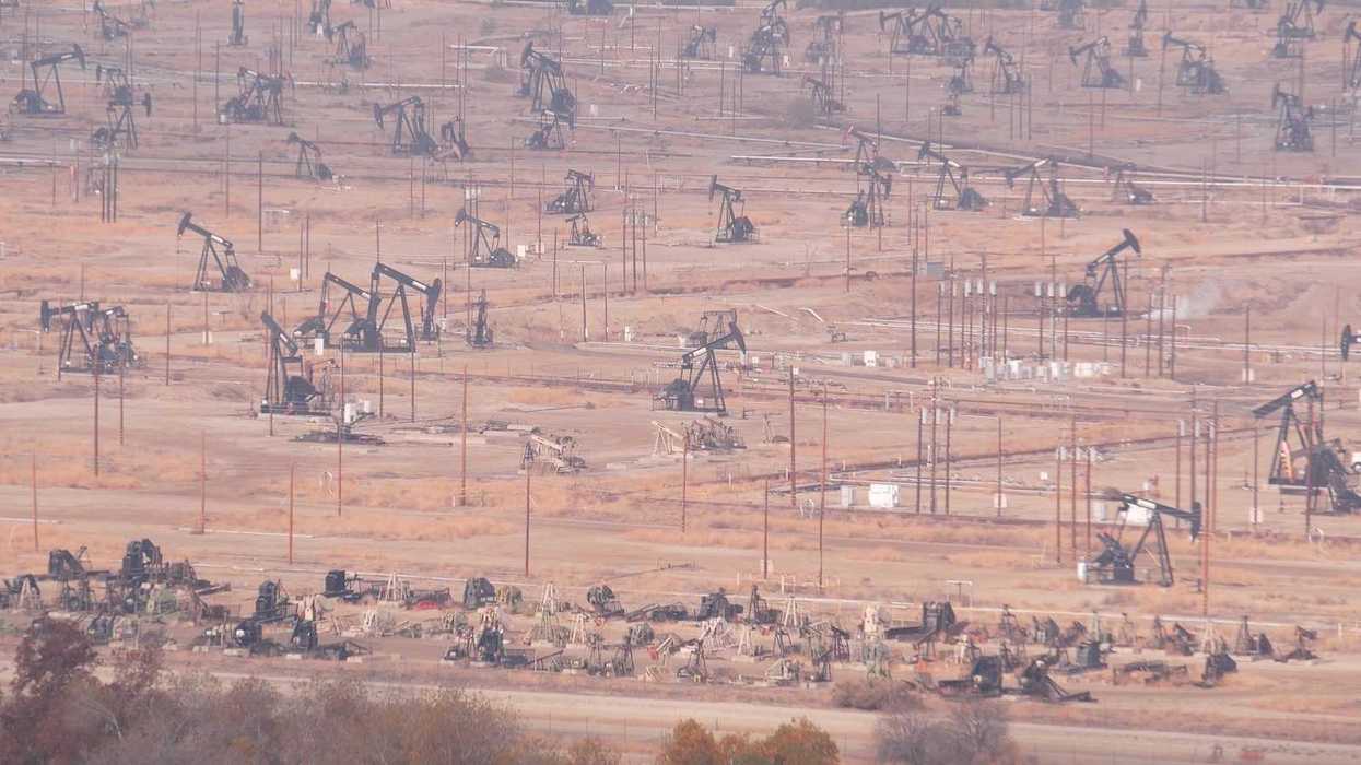 Myriad pump jacks working a crowded California oil field.