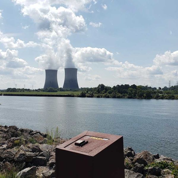 Nuclear plant cooling towers on a river