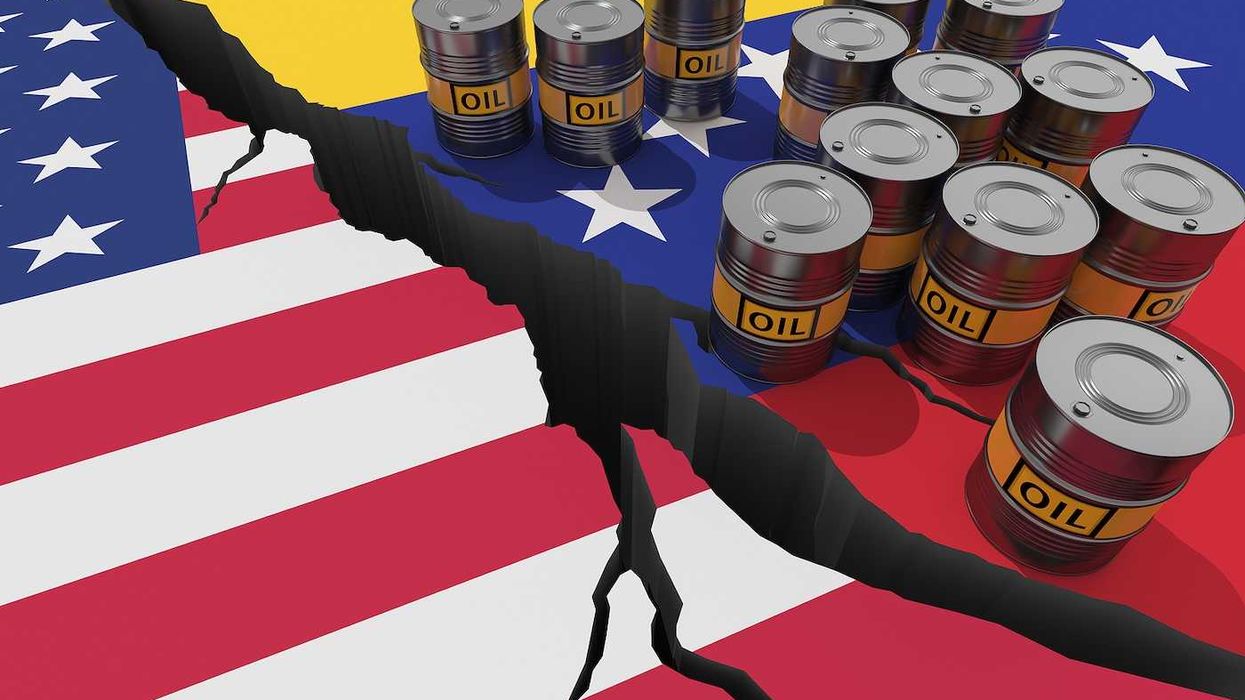 Oil barrels on background of the flags of Venezuela and USA.