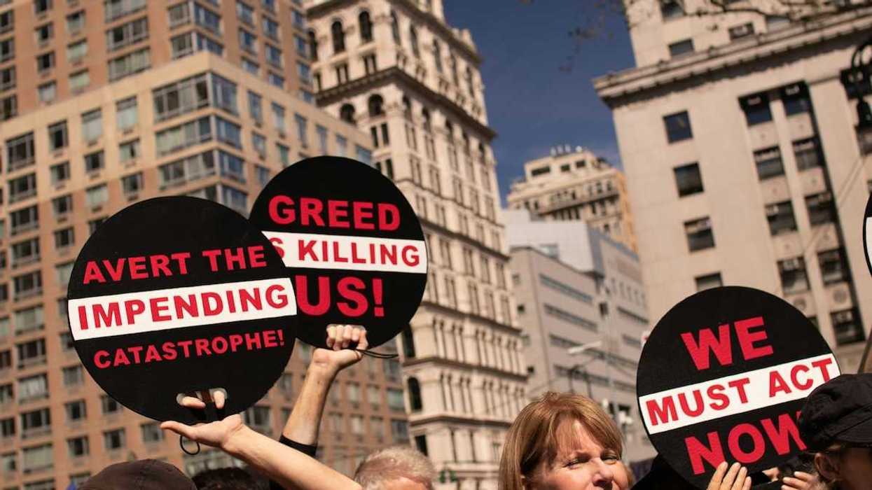 Peaceful protestors against greed and urging action