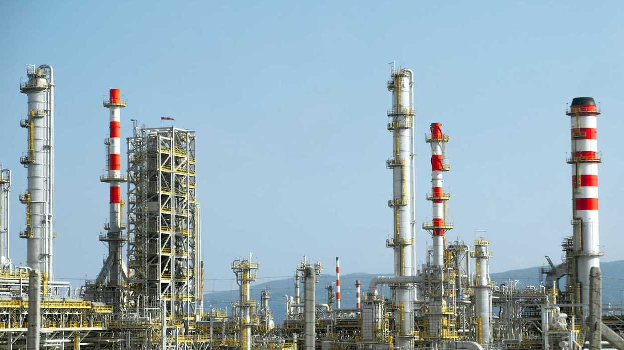 Petrochemical facility with multiple emissions stacks.