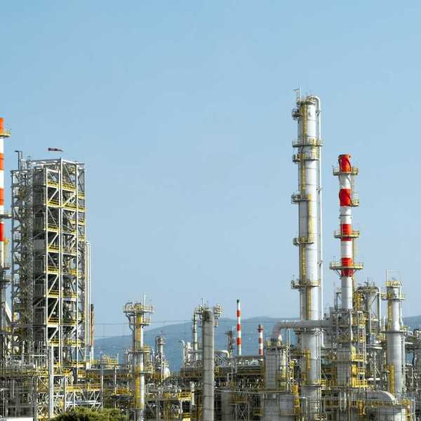 Petrochemical facility with multiple emissions stacks.