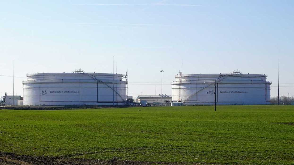 Petroleum storage tanks in a green industrial setting