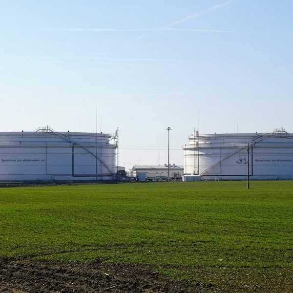 Petroleum storage tanks in a green industrial setting