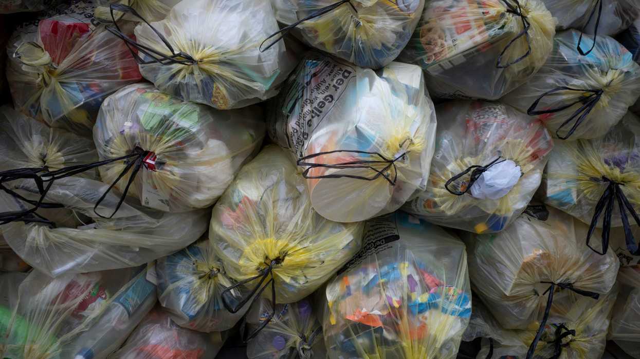 Pile of trash bags filled with garbage