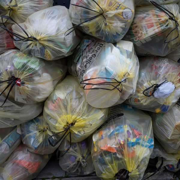 Pile of trash bags filled with garbage