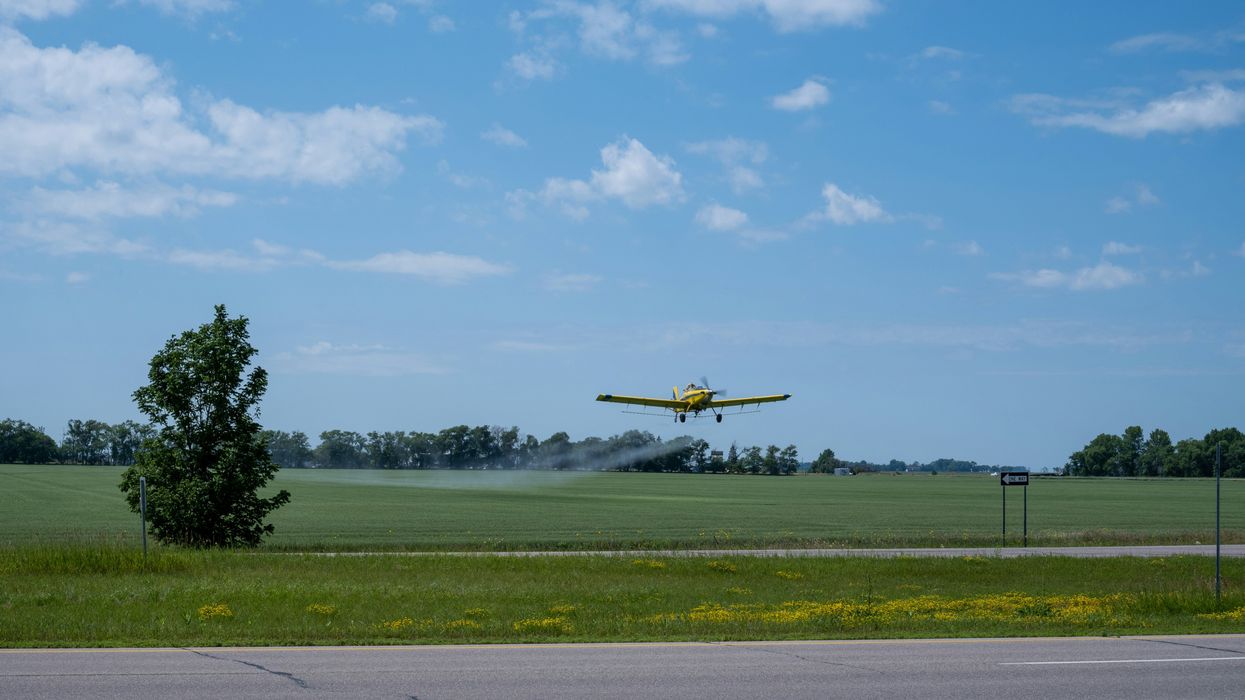 plane spraying pesticides