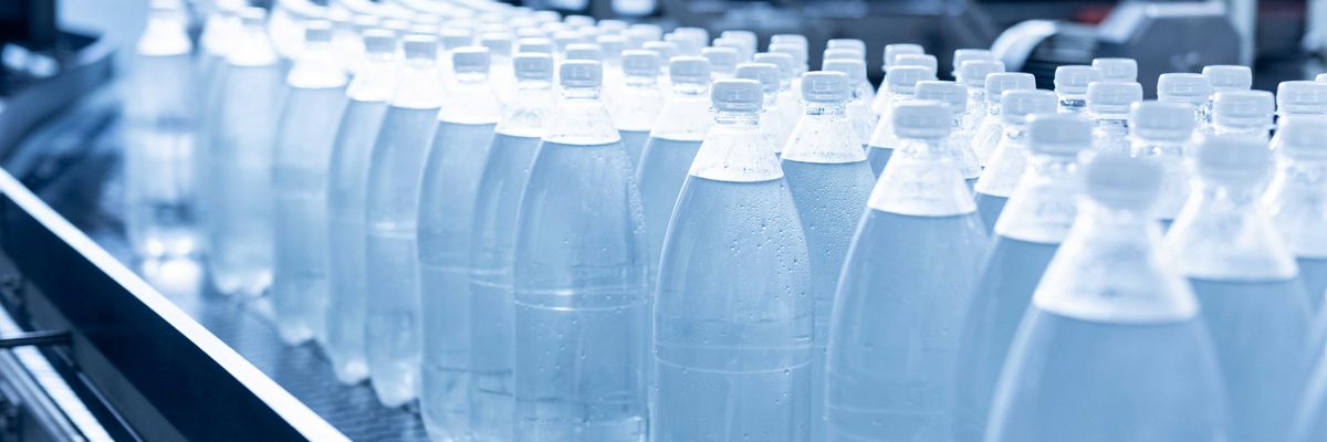 Plastic water bottles on a conveyor belt