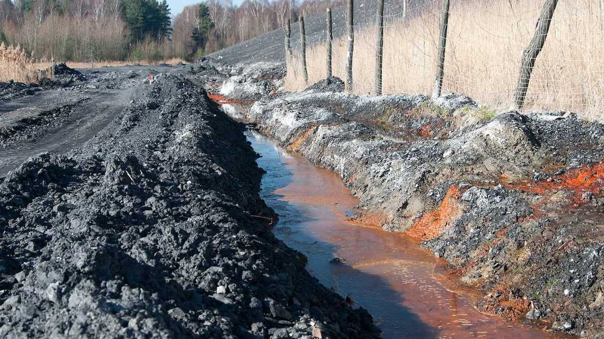 Polluted water adjacent to coal waste heap