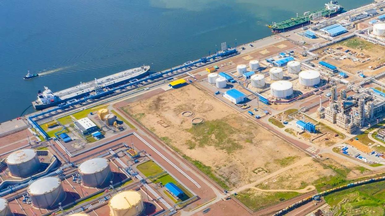 port refinery and petrochemical storage tanks adjacent to ocean