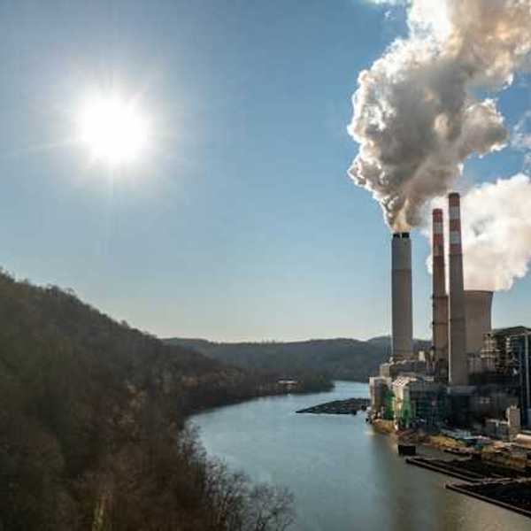 Power plant beside a river and forest