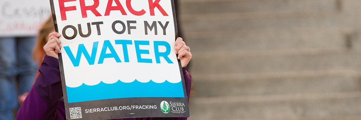 Protest sign that says Keep the frack out of my water