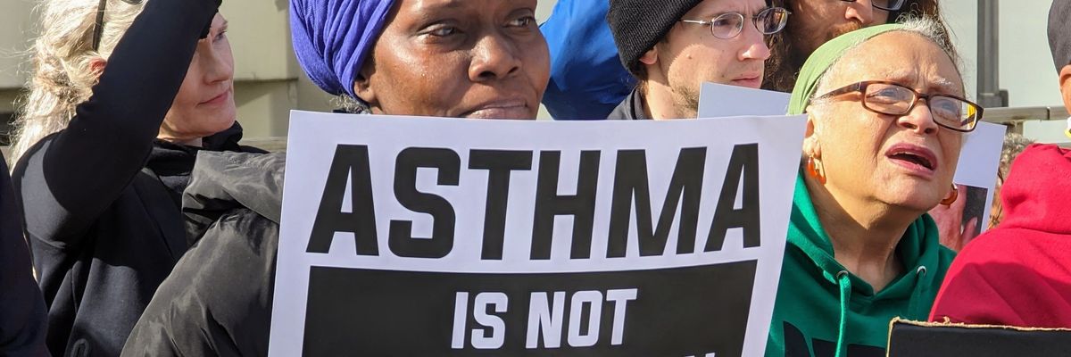 Protestors plead for their health outside a Pittsburgh gathering of coal and steel execs