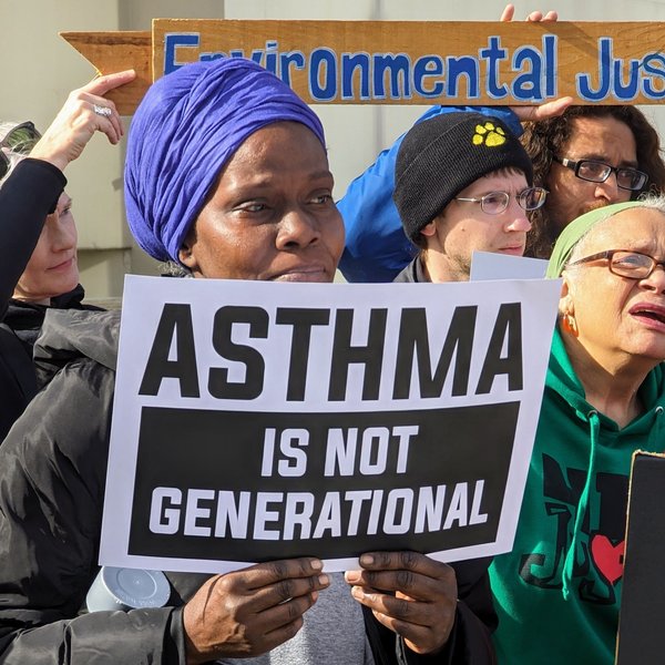 Protestors plead for their health outside a Pittsburgh gathering of coal and steel execs