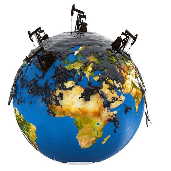 Pump jacks and oil spill over planet earth isolated on white background.