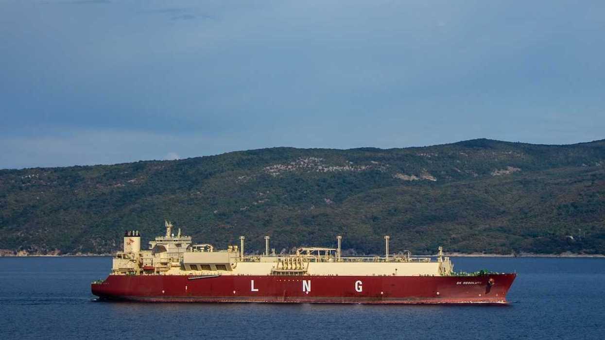 Red and white tanker with "LNG" printed on the side.