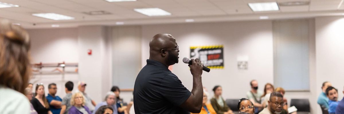 Resident speaks at an event about the Midwest hydrogen hub organized by Just Transition NWI.