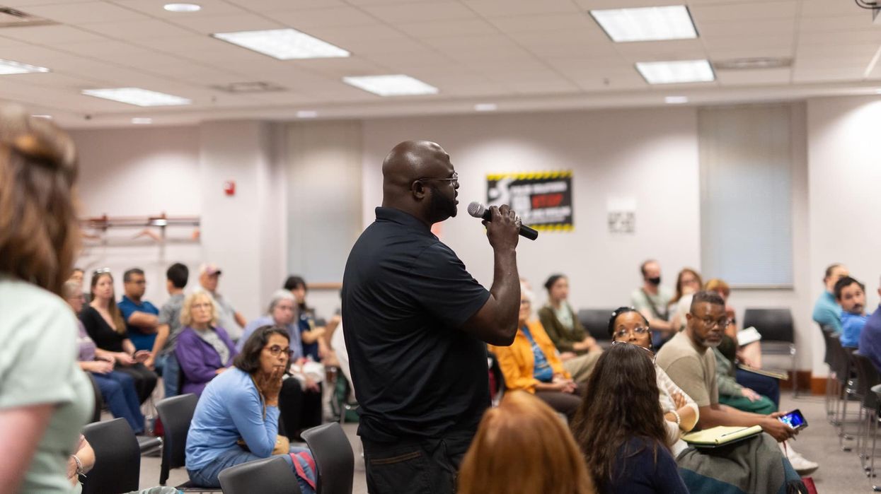 Resident speaks at an event about the Midwest hydrogen hub organized by Just Transition NWI.
