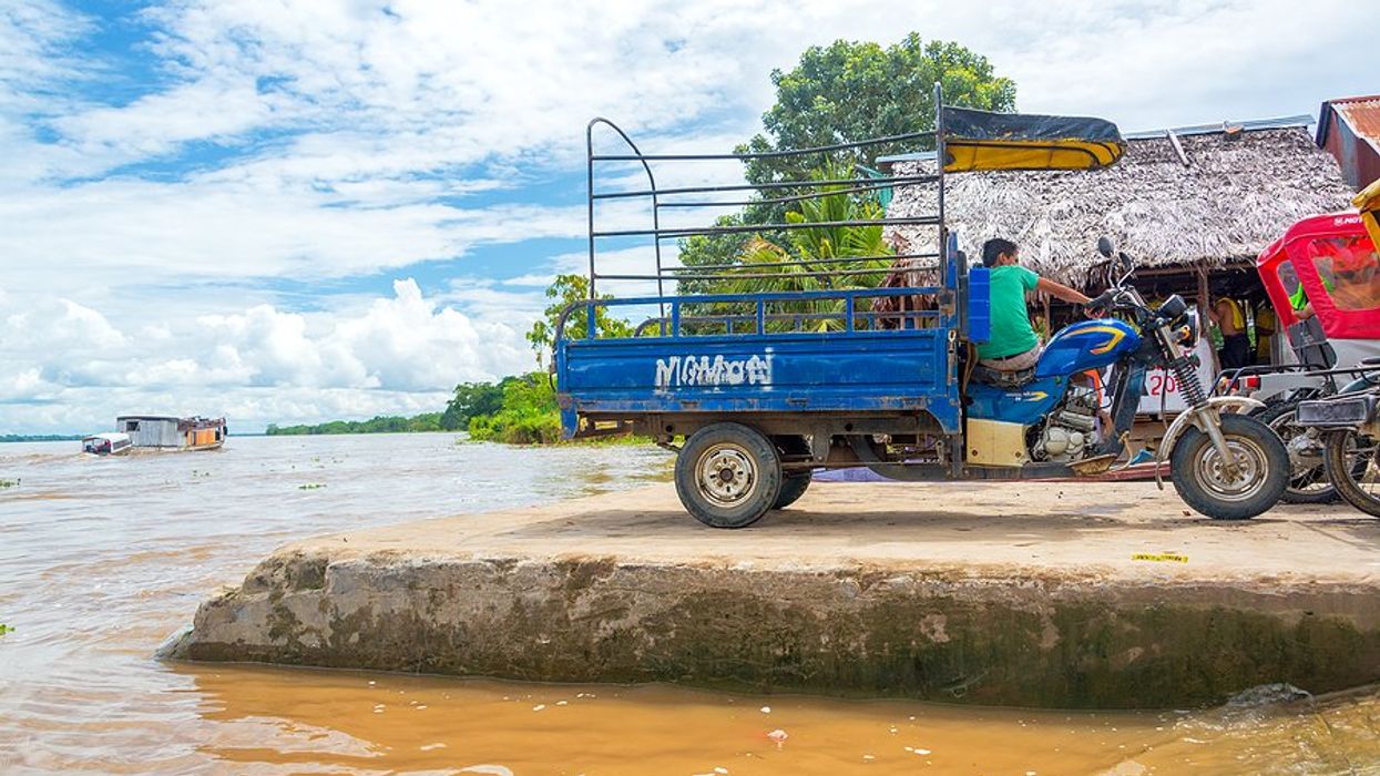 Rickshaw on the edge of the Nanay River in Peru.