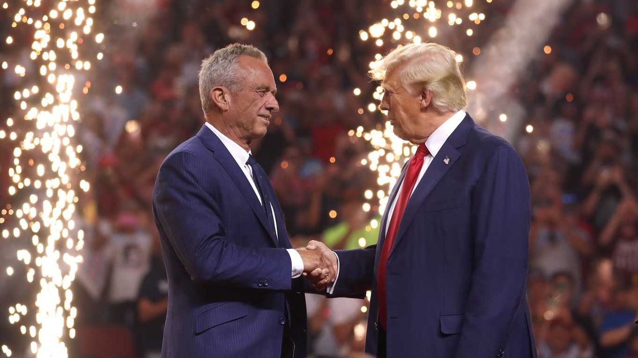 Robert F. Kennedy, Jr. and President Trump shaking hands at an Arizona for Trump rally