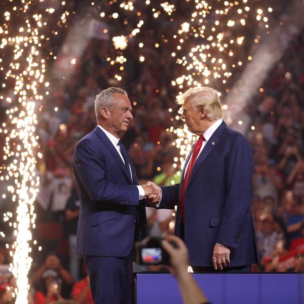 Robert F. Kennedy, Jr. and President Trump shaking hands at an Arizona for Trump rally