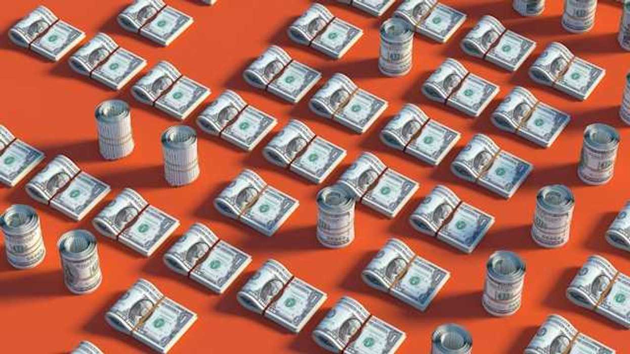 Rows of US dollars on a red background
