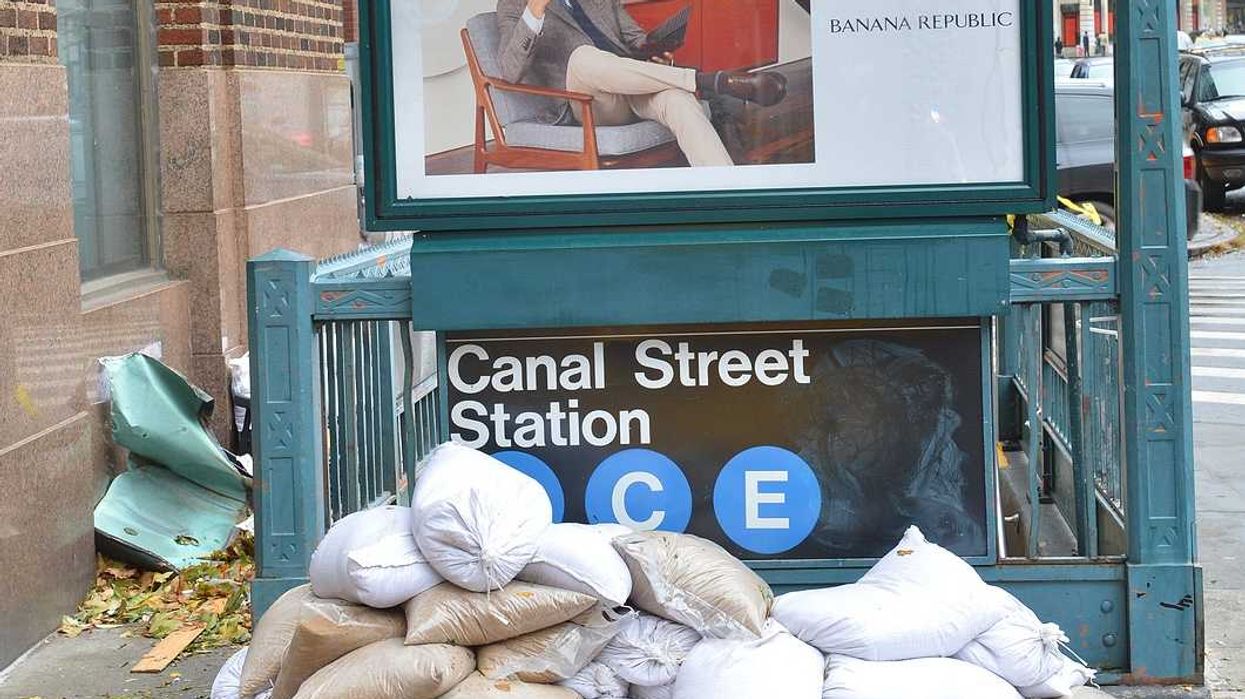 Sandbags piled at entrance to Canal Street Subway station NYC as a result of of Hurricane Sandy