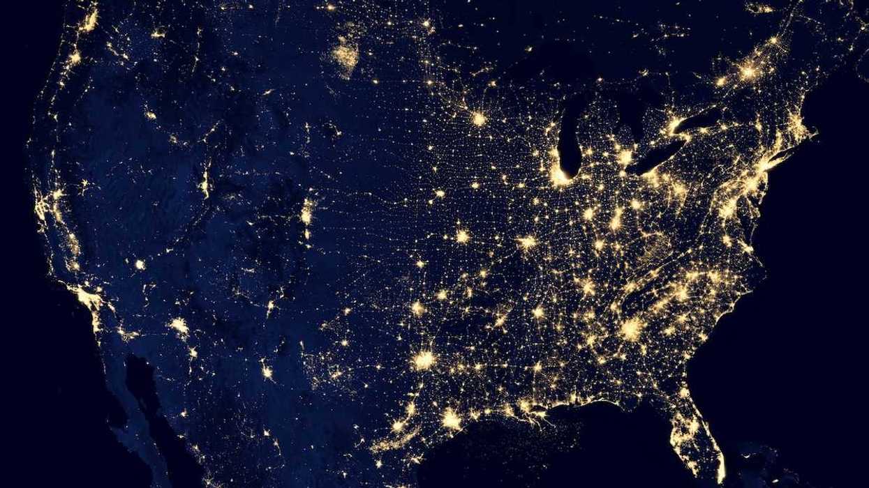 Satellite map of the continental US taken at night showing lights from major metropolitan areas