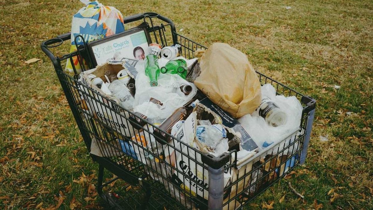 Shopping cart full of plastic waste