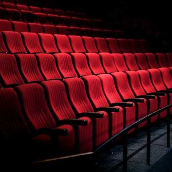Side view of red seats at a movie theater