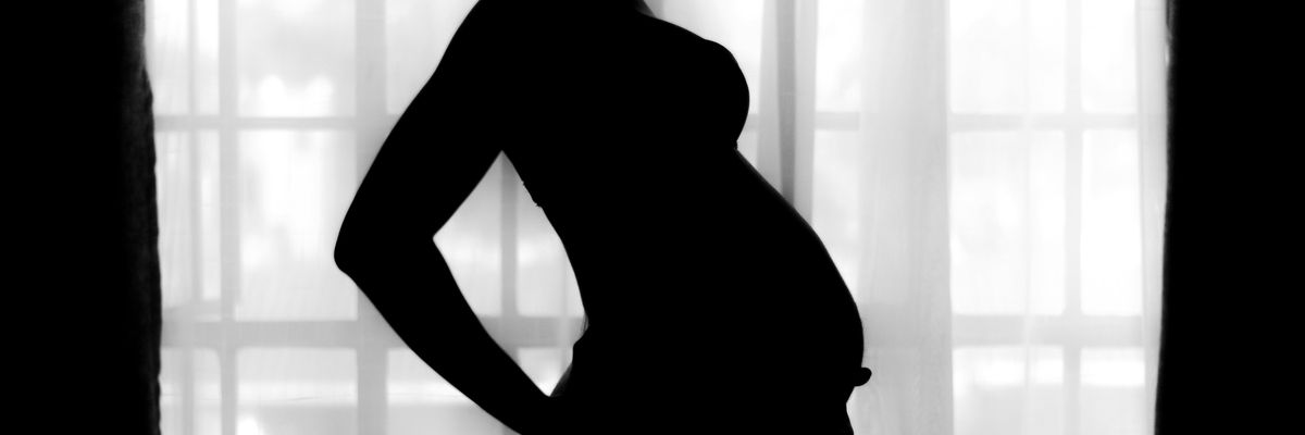 silhouette of pregnant woman