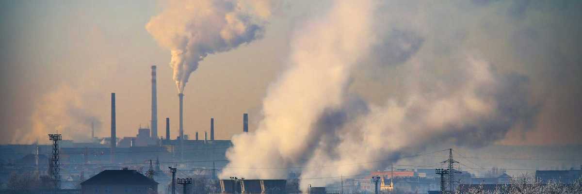 Smoke stacks release industrial air pollution
