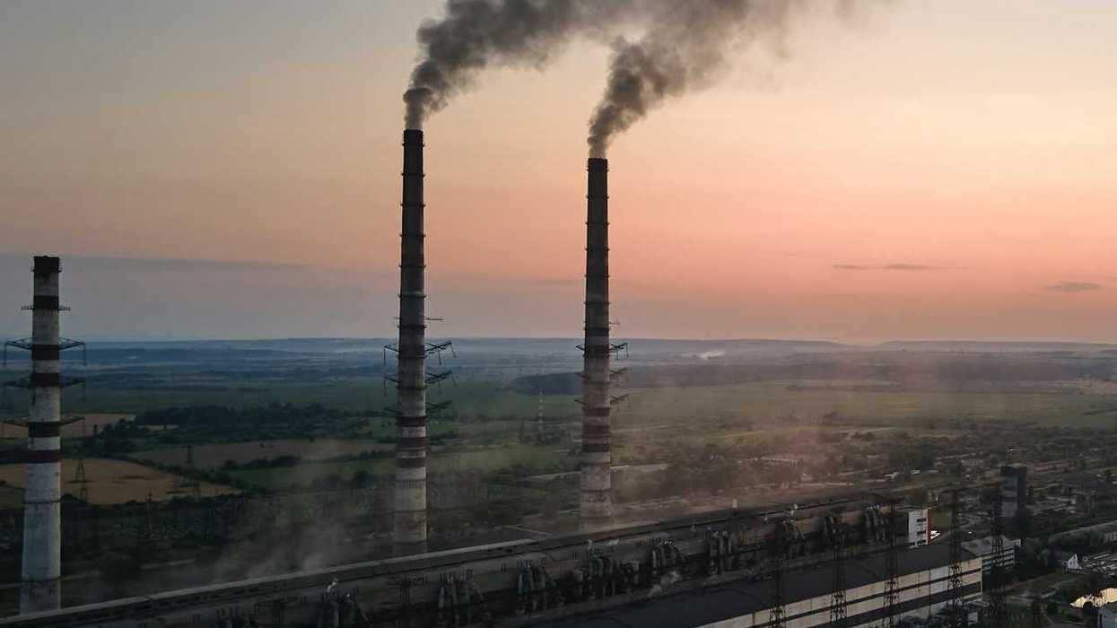 Smokestacks emitting pollution at coal-fired facility