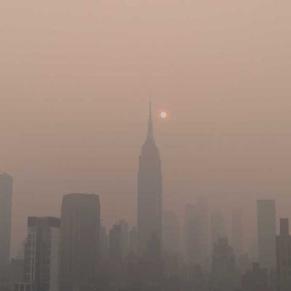Smoky skies in NYC showing the Empire State Building in the center