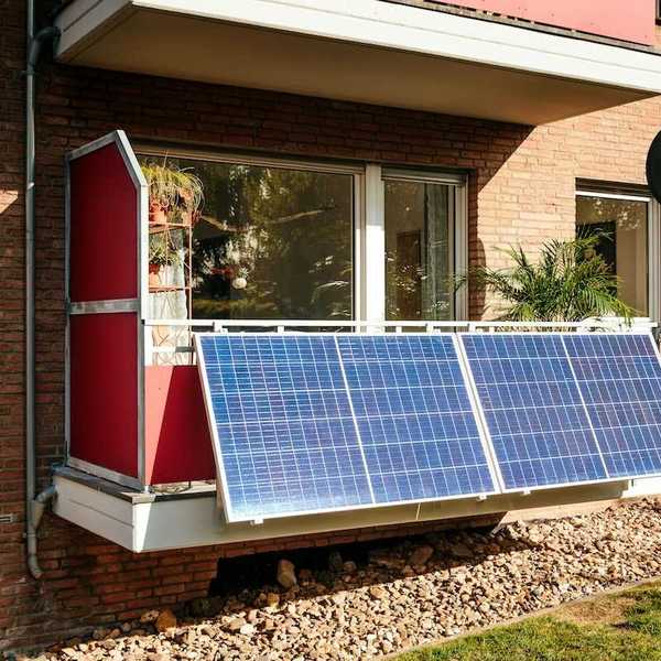 Solar panels mounted on outside of an apartment (aka "balcony solar").