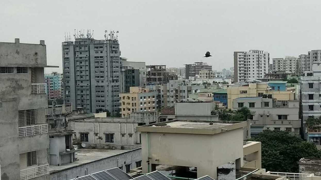 Solar panels on Bangladeshi city rooftop in Dhaka