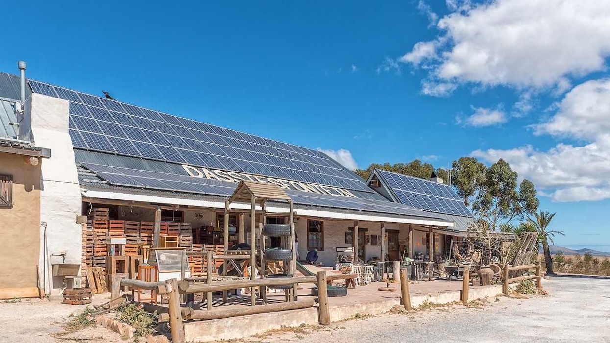 Solar panels on the roof of a roadside business establishment in South Africa