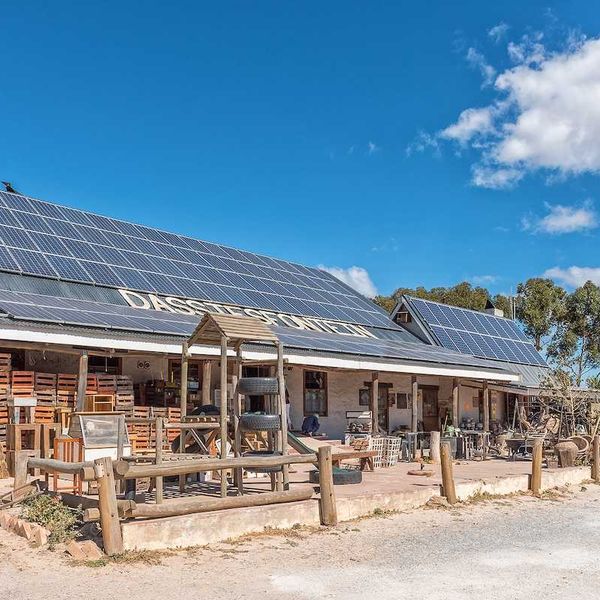 Solar panels on the roof of a roadside business establishment in South Africa