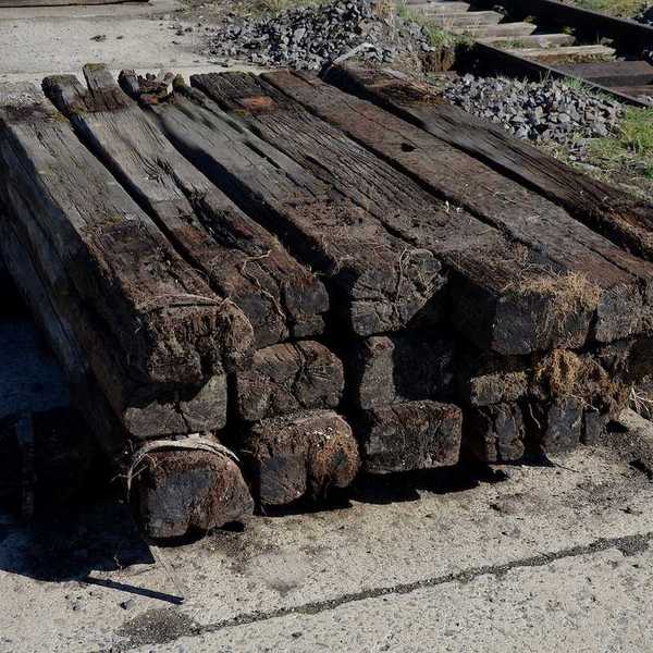 Stack of old creosote-soaked railroad ties