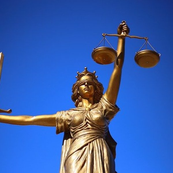 statue of lady justice with scales and sword