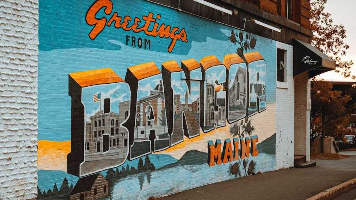 Street-level mural on a brick building in downtown Bangor, Maine