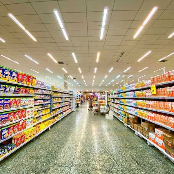 Supermarket aisle heavily stocked with ultraprocessed food choices