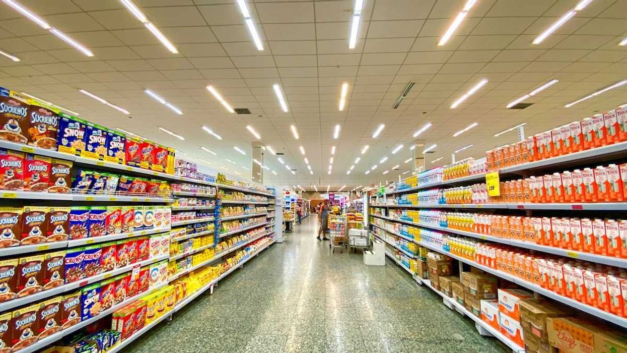 Supermarket aisle replete with massive selection of processed and ultra-processed food