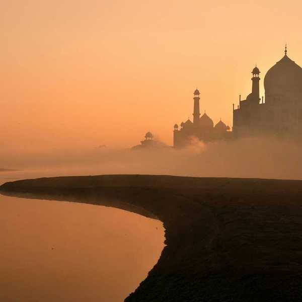 Taj Mahal against a hazy sunrise