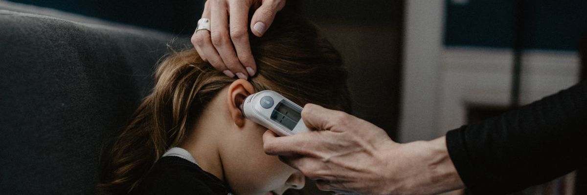 Taking child temperature