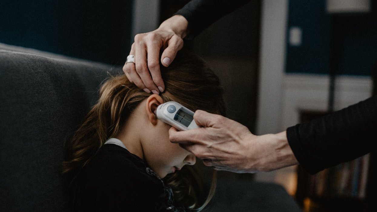 Taking child temperature