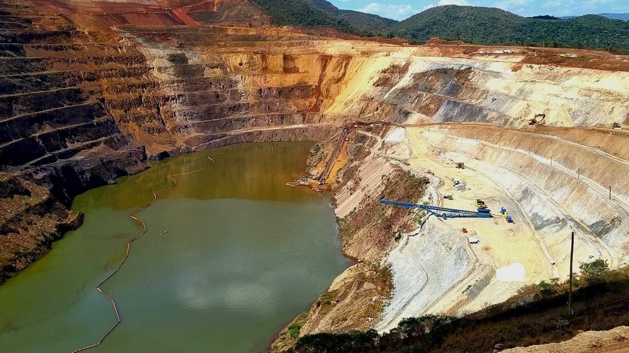 Terraced copper mine partially filled with water