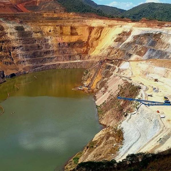 Terraced copper mine partially filled with water